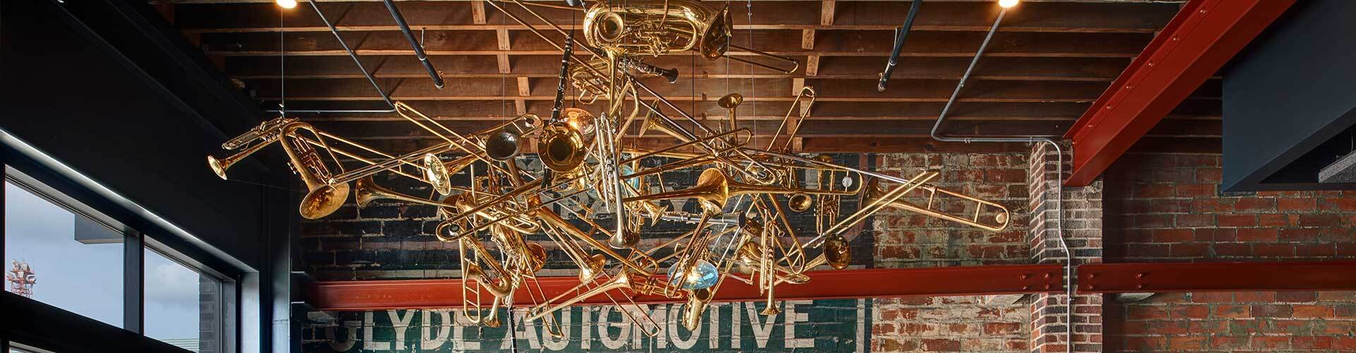 Noce Daylight sign w/ trumpet chandelier